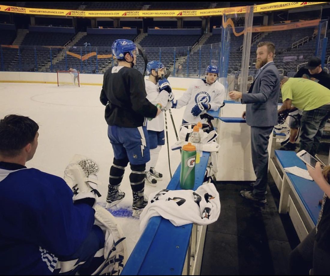 Directing on the Lightning bench during a practice shoot.